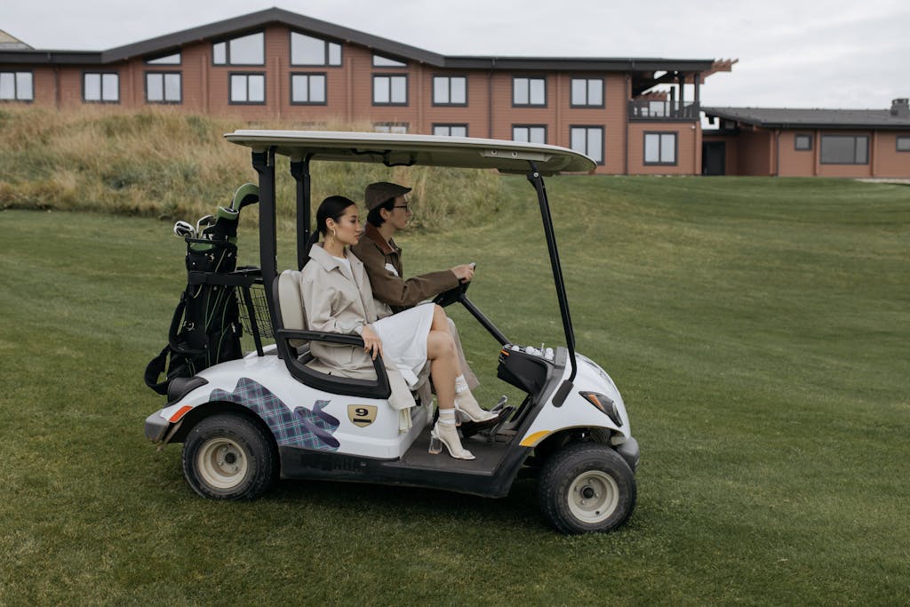 Man and Woman in the Golf Cart